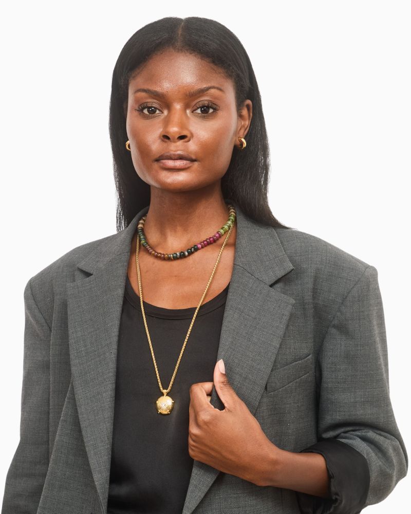 Multi bead tourmaline choker necklace shown with linen drawstring pouch