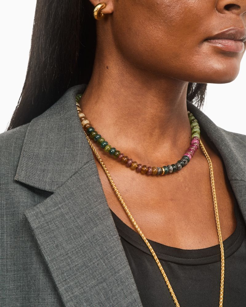 Close-up of colourful bead choker necklace with lobster clasp fastening