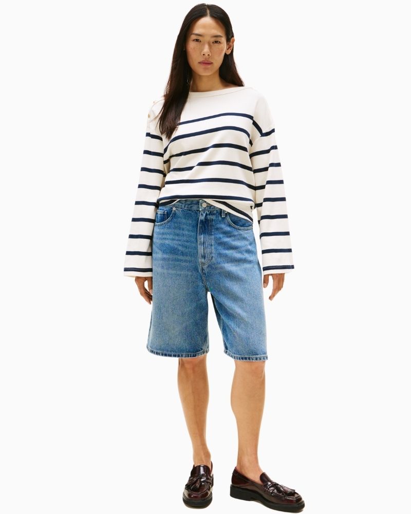 Nautical-inspired long sleeve cotton top styled with navy trousers