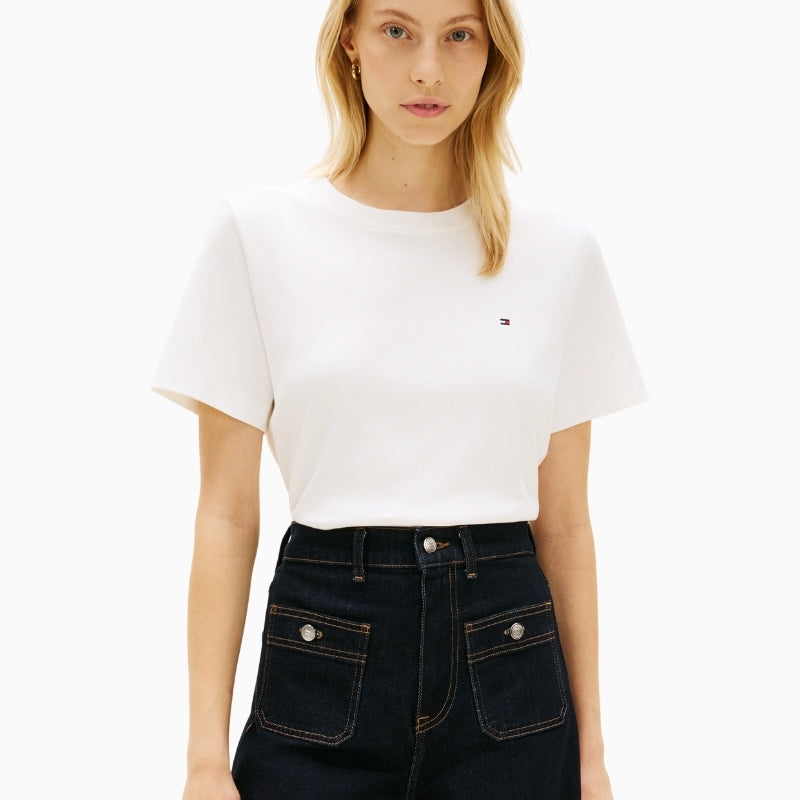 Woman wearing Tommy Hilfiger white boxy interlock tee front view – Áines Boutique