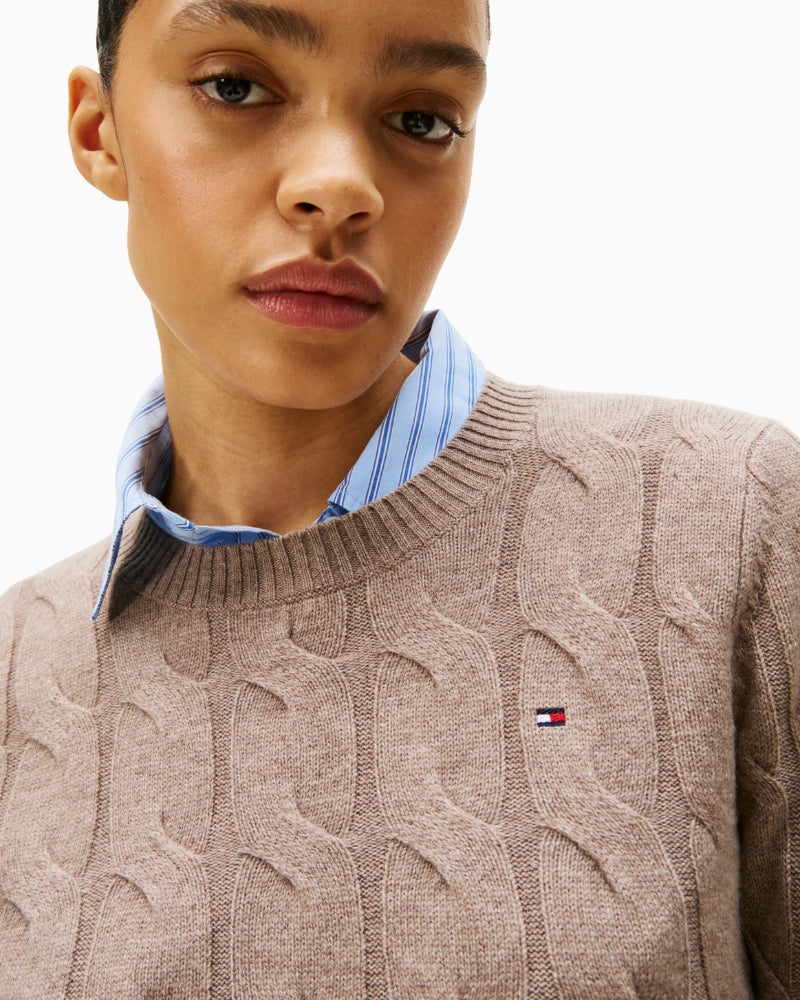 Close-up of chunky cable-knit texture in pure wool