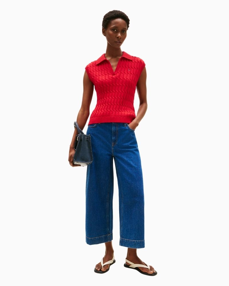 Front Neutral sleeveless cable knit vest styled with soft tailoring