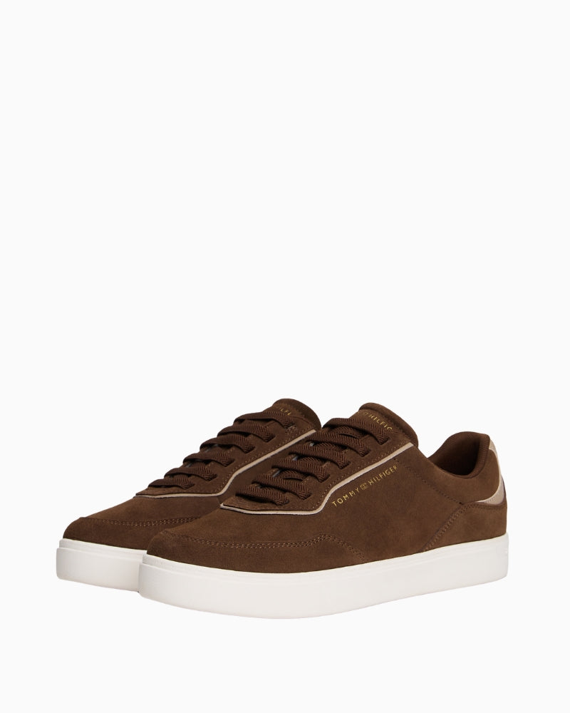 Side view of casual suede sneaker showing regular fit and leather upper by Tommy Hilfiger