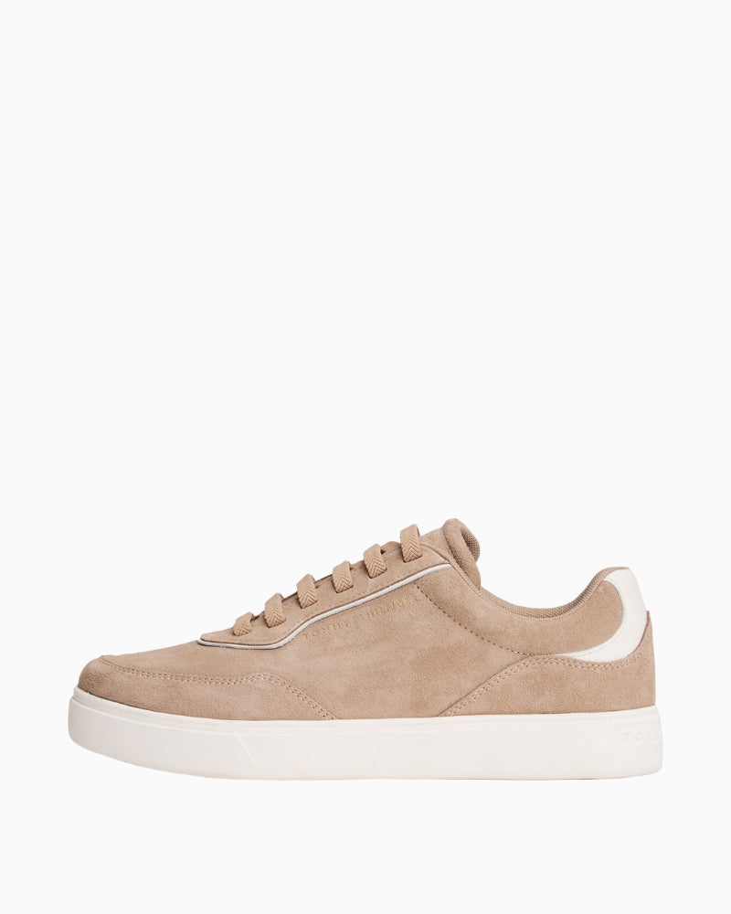 Side view of Tommy suede sneakers showing soft finish and lace-up design