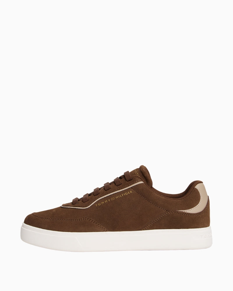 Side view of casual suede sneaker showing regular fit and leather upper by Tommy Hilfiger