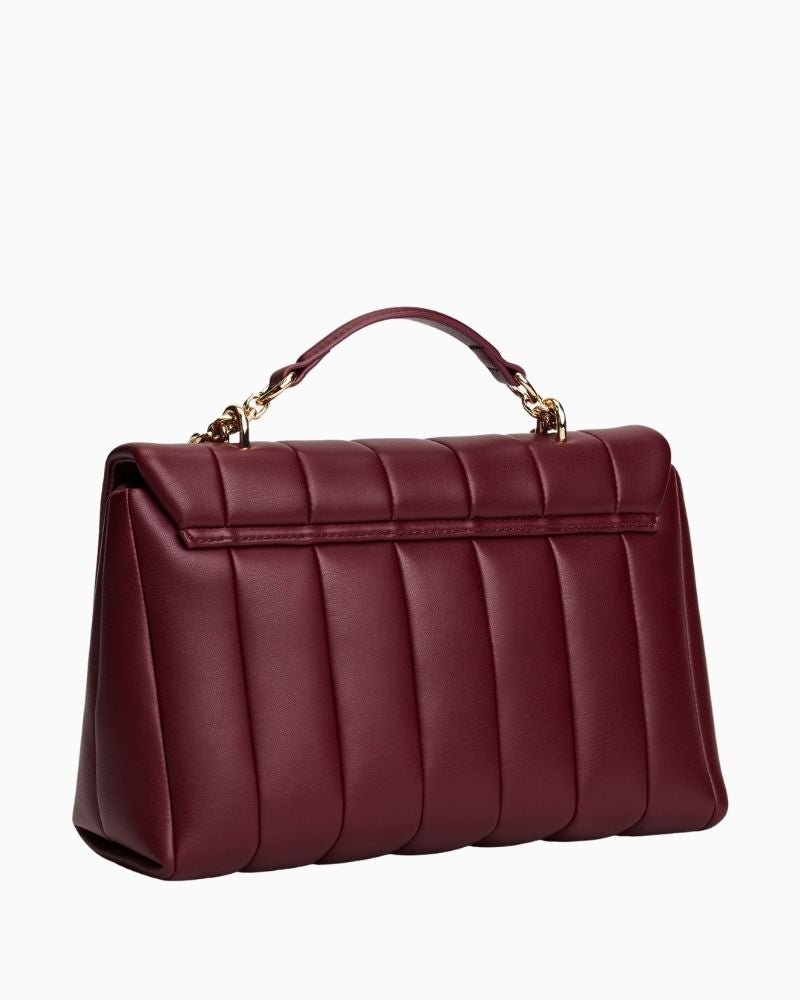 Back view of Tommy Hilfiger padded black crossbody bag with chain strap and monogram plaque