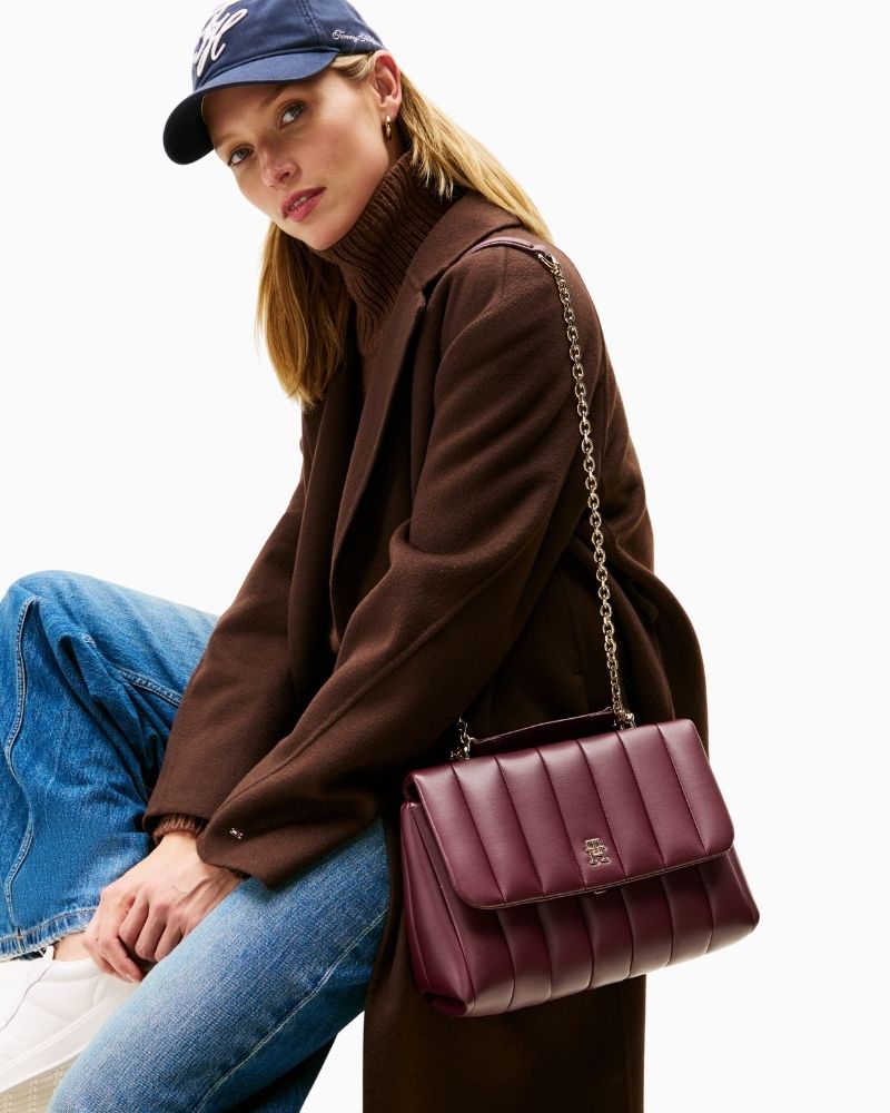 Tommy Hilfiger padded black crossbody bag with chain strap and monogram plaque