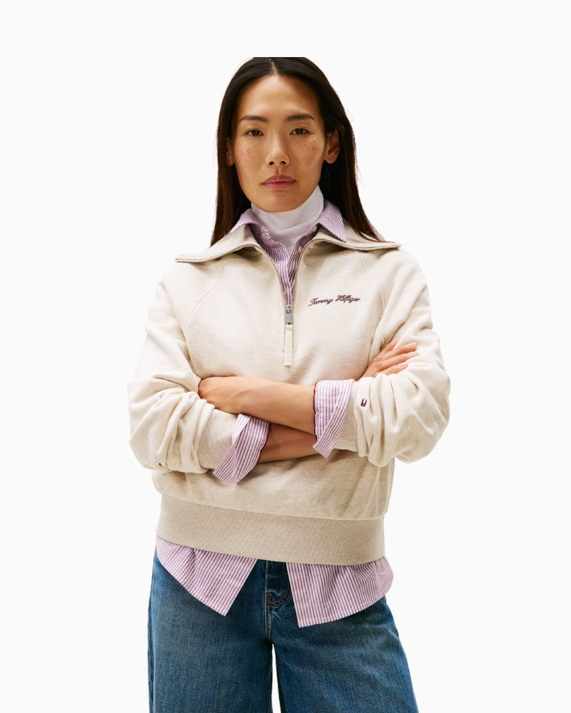 Beige Tommy Hilfiger fleece half-zip pullover with script logo