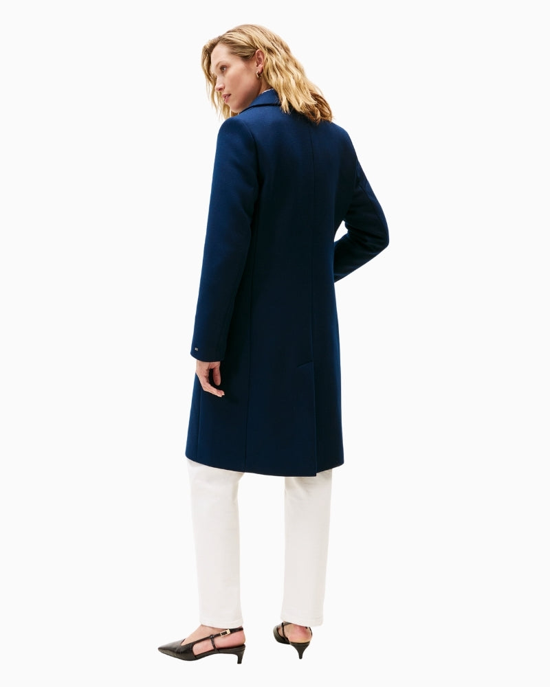 Back view of Tommy Hilfiger wool coat showing clean cut and knee-length design