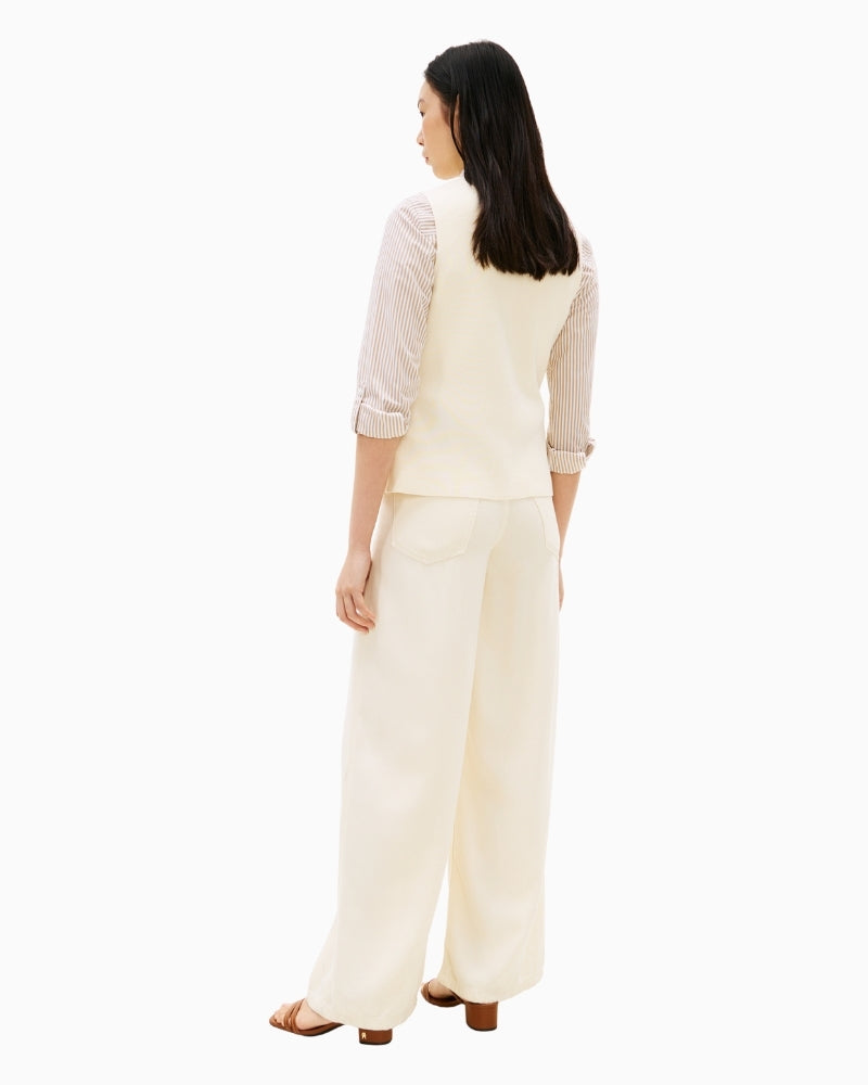 Woman wearing Tommy Hilfiger cotton slim knit vest cream back view – Áines Boutique