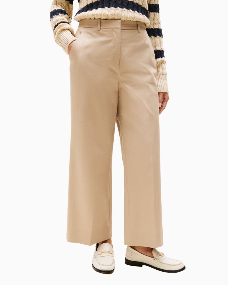 Close up of Tommy Hilfiger beige wide leg cotton chinos with ankle length cut