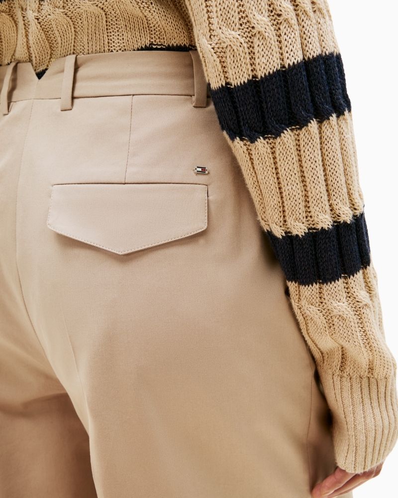 Close up of Tommy Hilfiger beige wide leg cotton chinos with ankle length cut