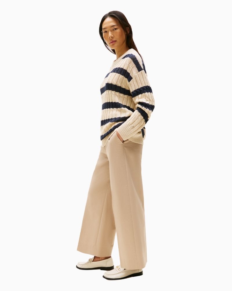 Side view of cotton chinos showing relaxed leg and structured waist