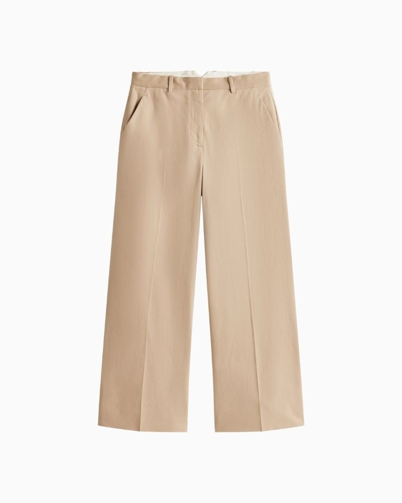 Front of Tommy Hilfiger beige wide leg cotton chinos with ankle length cut