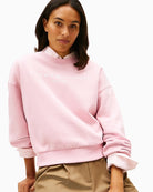 Close-up of Tommy Hilfiger logo on chest