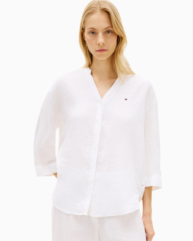Woman wearing Tommy Hilfiger linen collarless shirt white front view – Áines Boutique