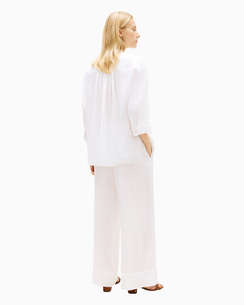 Woman wearing Tommy Hilfiger linen collarless shirt white back view – Áines Boutique