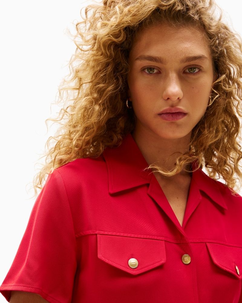 Close-up view of viscose fit-and-flare dress with collar and chest pockets