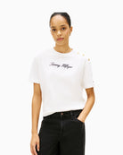 Front view of Tommy Hilfiger ecru tee with gold shoulder buttons