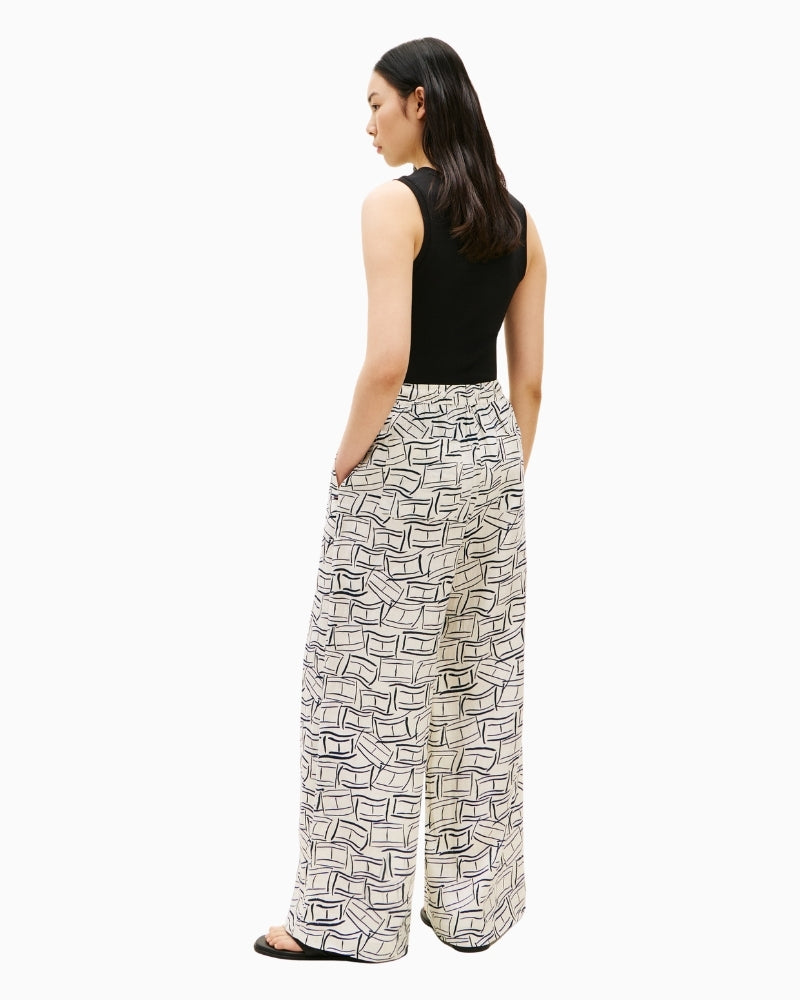 Back of Tommy Hilfiger linen pants styled with sandals – Áines Boutique