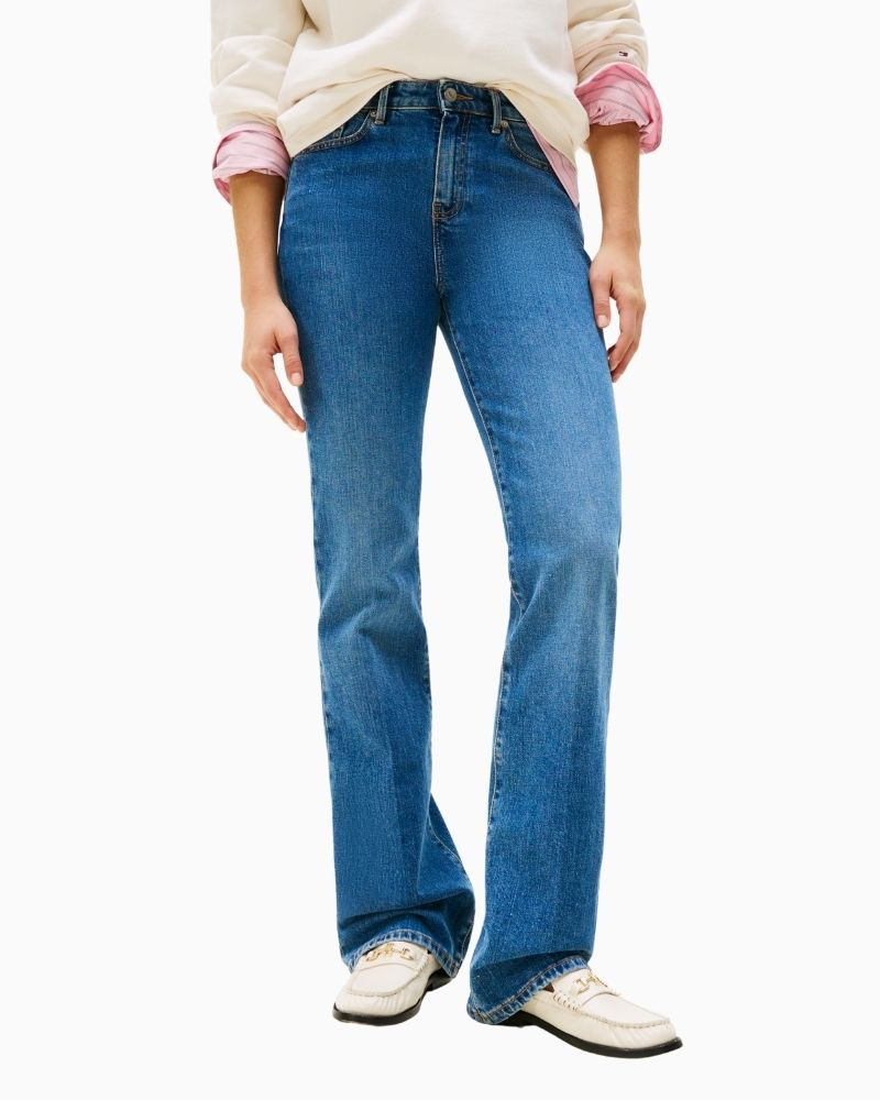 Front view of five-pocket bootcut jeans with button and zip closure