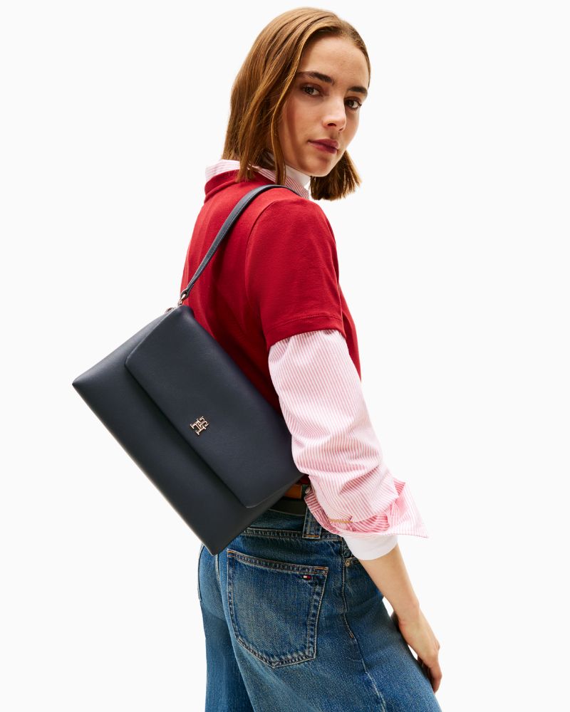 Tommy Hilfiger navy shoulder bag with monogram plaque and removable crossbody strap