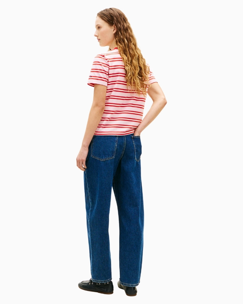 Side view of pink striped Tommy Hilfiger regular fit T-shirt on model – Áines Boutique