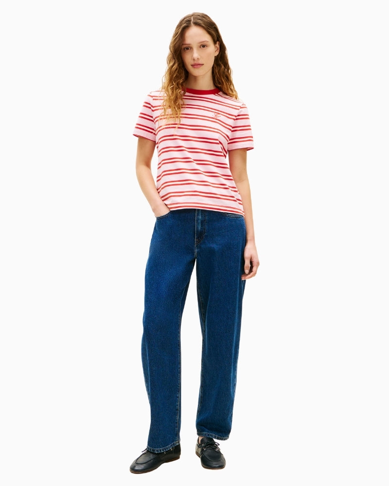 Woman wearing pink and red striped Tommy Hilfiger crew neck T-shirt front view – Áines Boutique