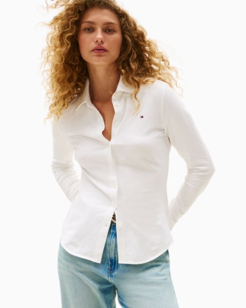 Tommy Hilfiger slim fit piqué shirt in white with embroidered flag logo