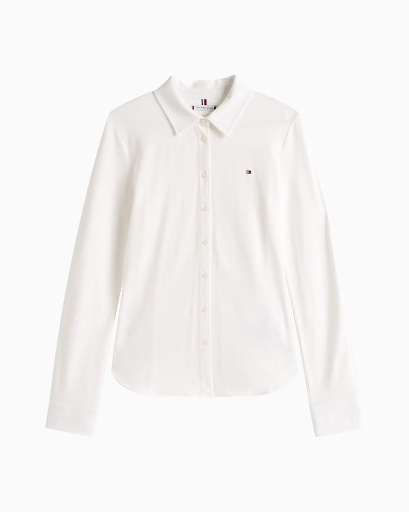 Tommy Hilfiger slim fit piqué shirt in white with embroidered flag logo