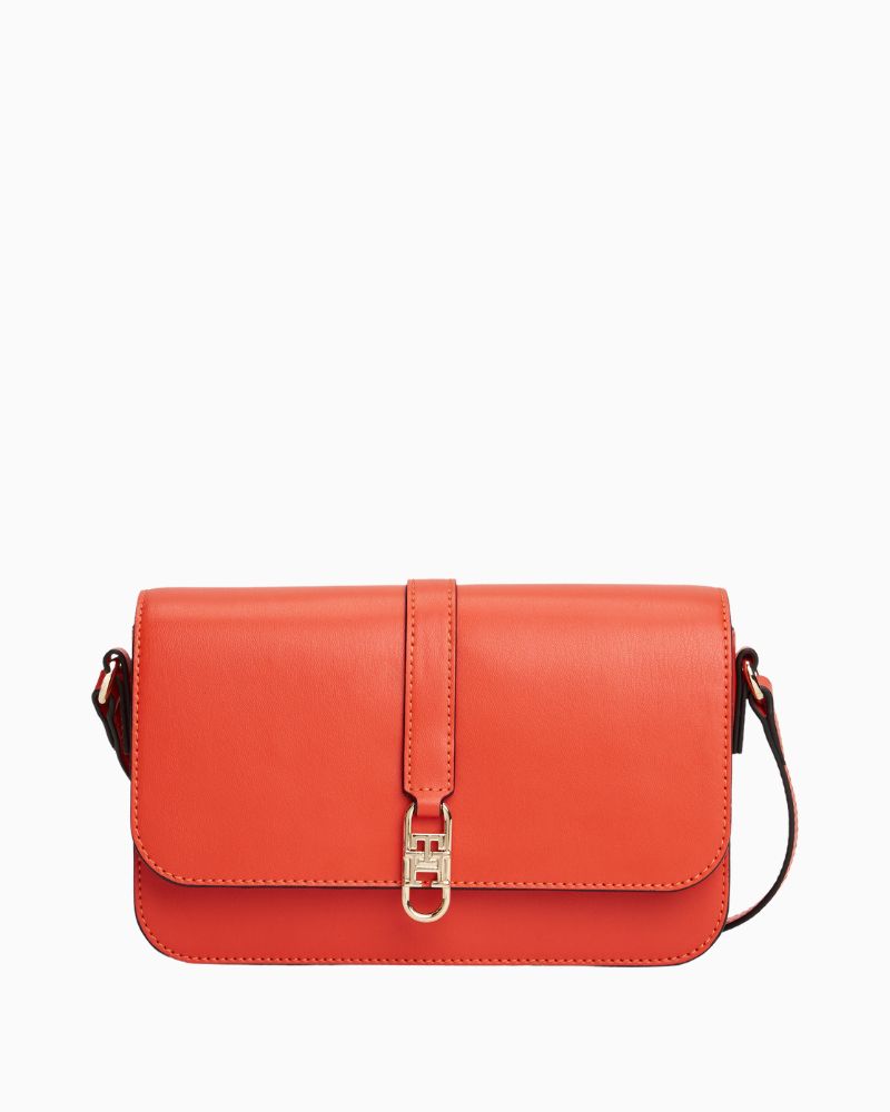 Tommy Hilfiger orange crossover bag with flap closure and adjustable strap