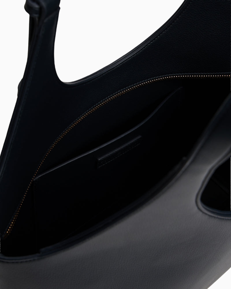 Interior of Tommy tote showing ample space for daily essentials