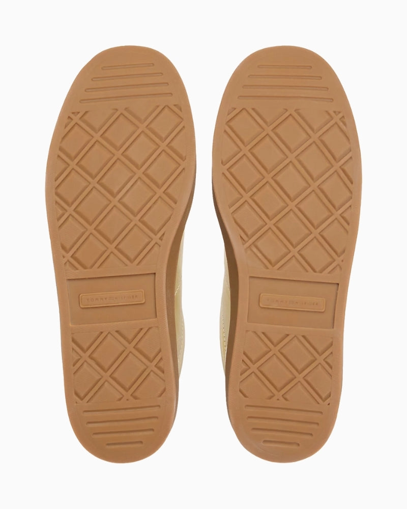 Back view of trainers with metallic flag detail on heel