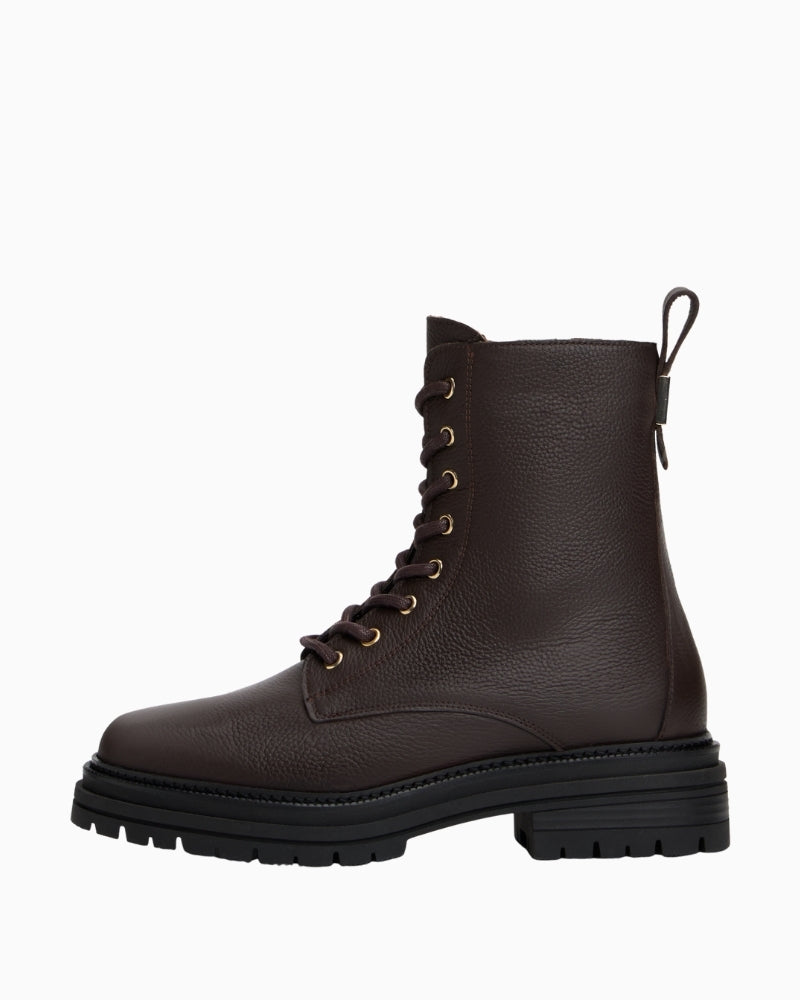 Side view of warm lined Tommy Hilfiger ankle boots in textured leather