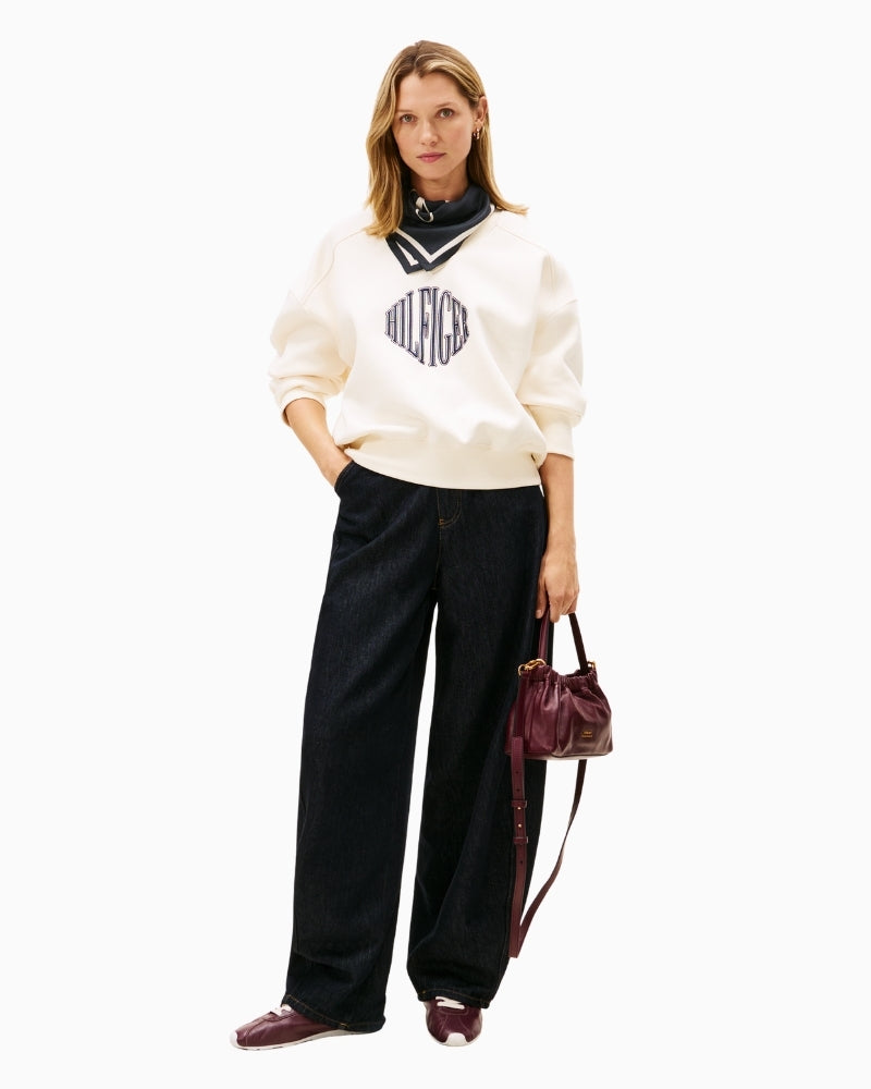 Model wearing off-white fleece sweatshirt with joggers