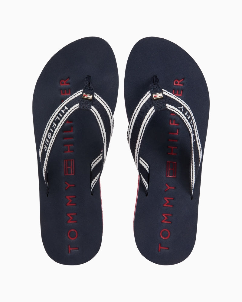 Navy Tommy Hilfiger flip-flop sandal top view with branded footbed – Áines Boutique