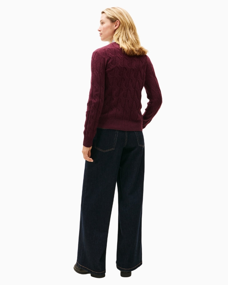 Back view of crew neck wool sweater with ribbed hem and cuffs