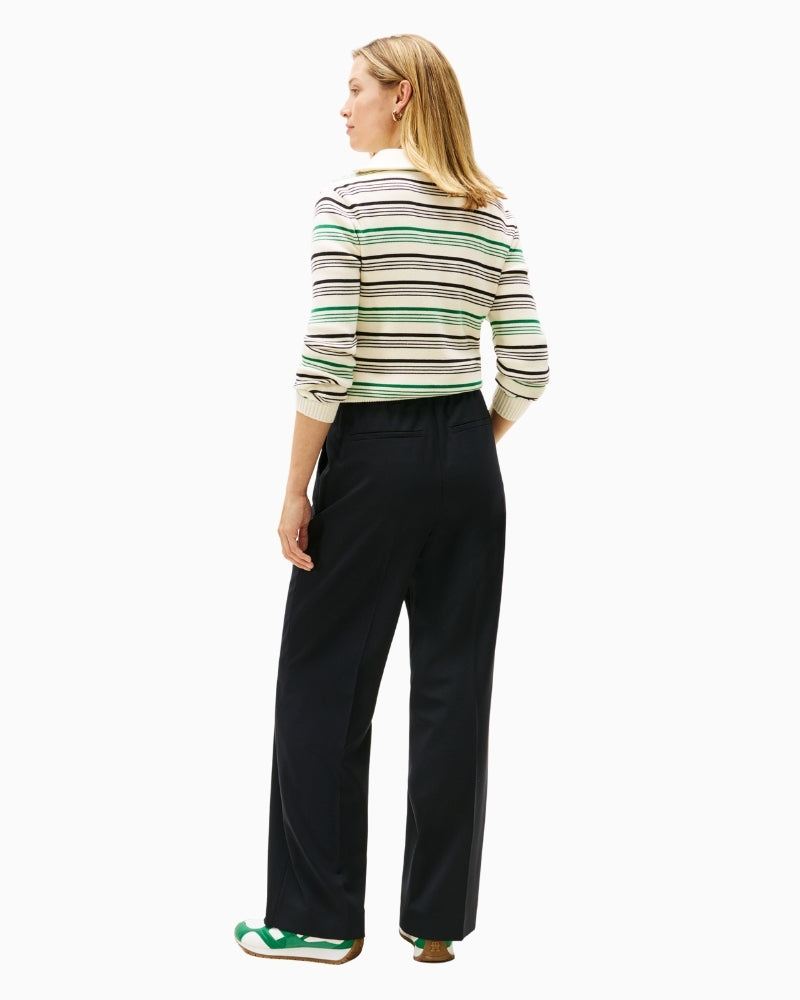 Back view of tailored wool trousers with clean lines