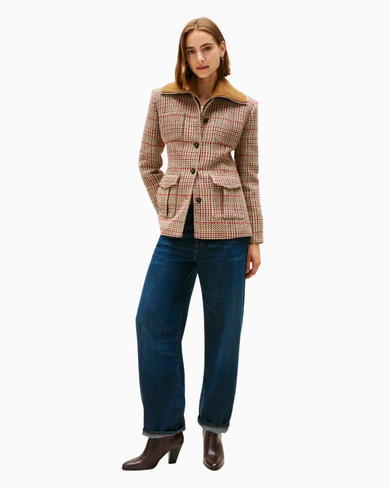 Outfit styled with dark denim jeans and jacket