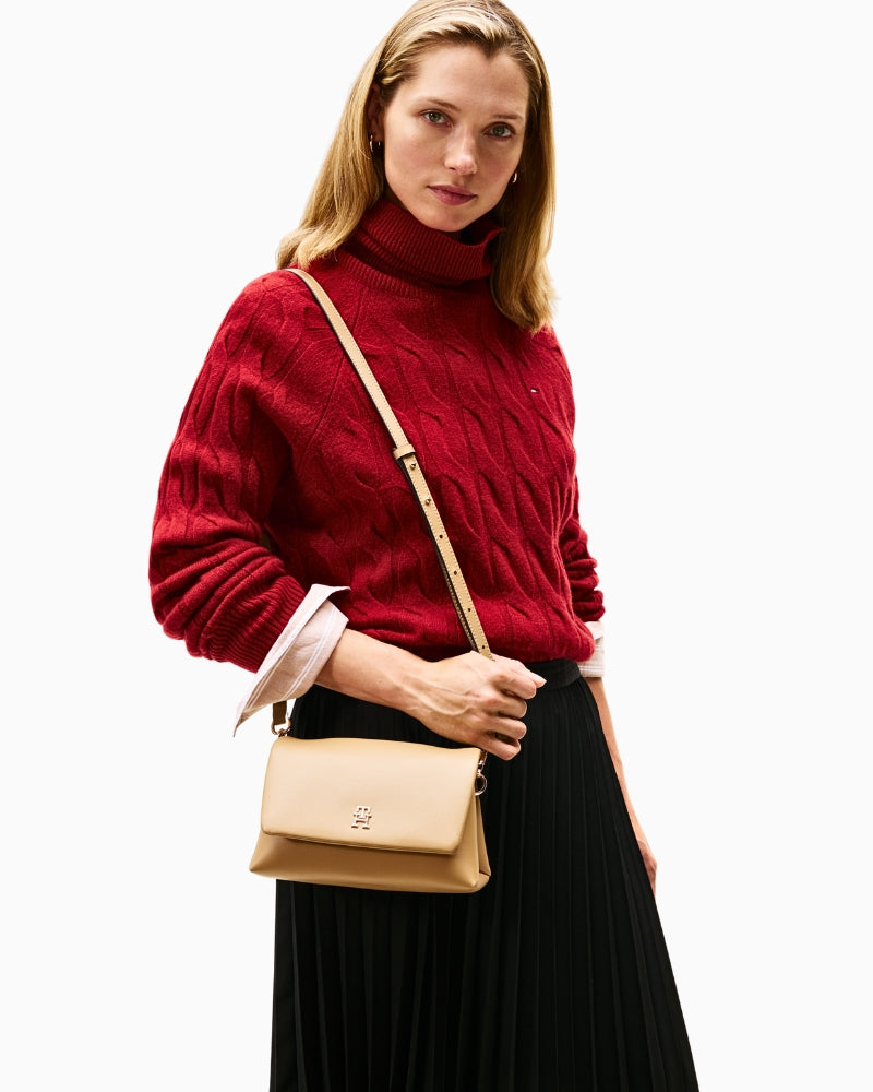 Model wearing Tommy Hilfiger Mini Crossover with adjustable strap and stitching