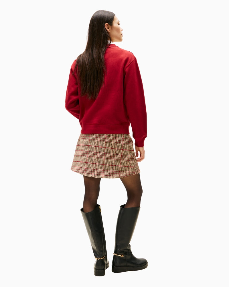 Back view of Red pullover with ribbed cuffs and hem