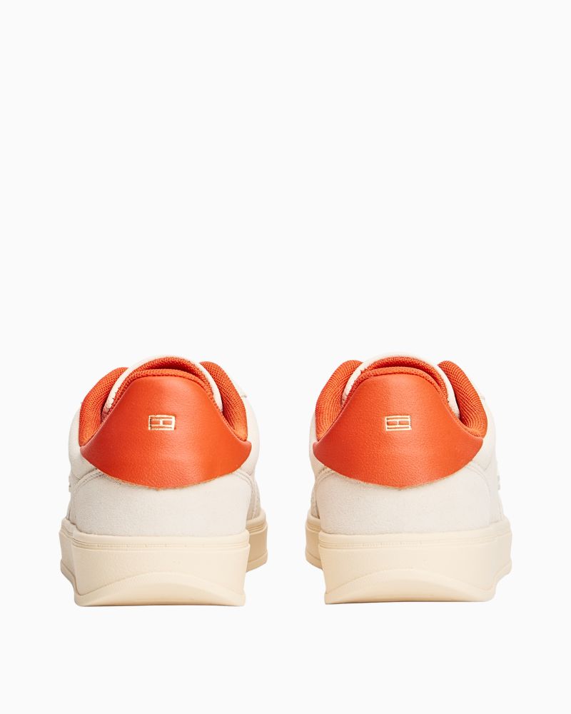 Back view of beige TH Heritage sneakers with classic lace-up design