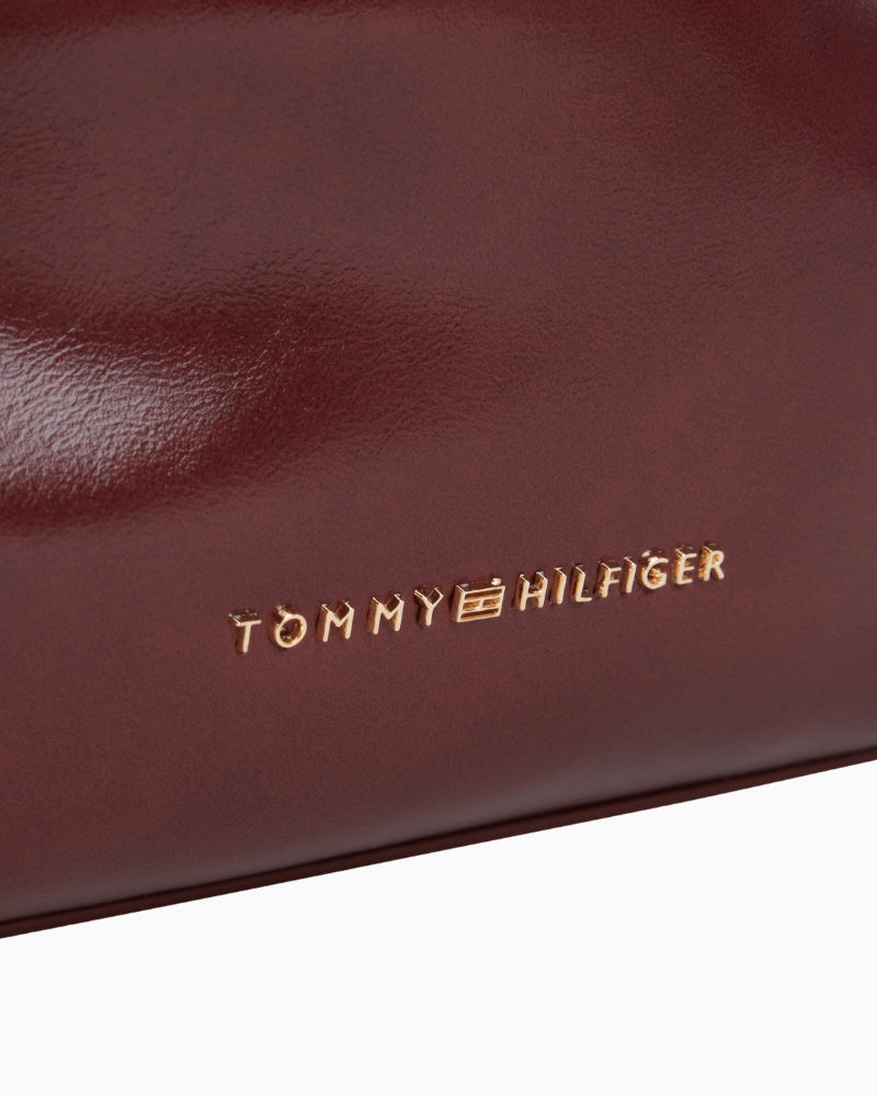 Tommy Hilfiger TH Modern Chain Clutch Patent in Burgundy patent-style finish close-up