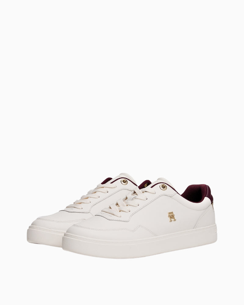 Angled front view of the white leather Tommy Hilfiger trainer