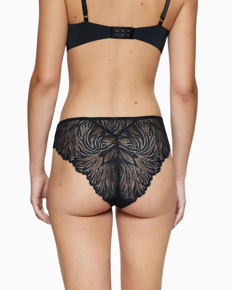 Back view of Triumph Pretty Micro black string brief showing minimal coverage