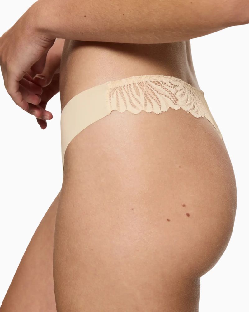 Side View of Triumph lightweight string brief with soft lace detail