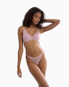 Triumph Signature Sheer string brief in nude with smooth lace and flat waistband