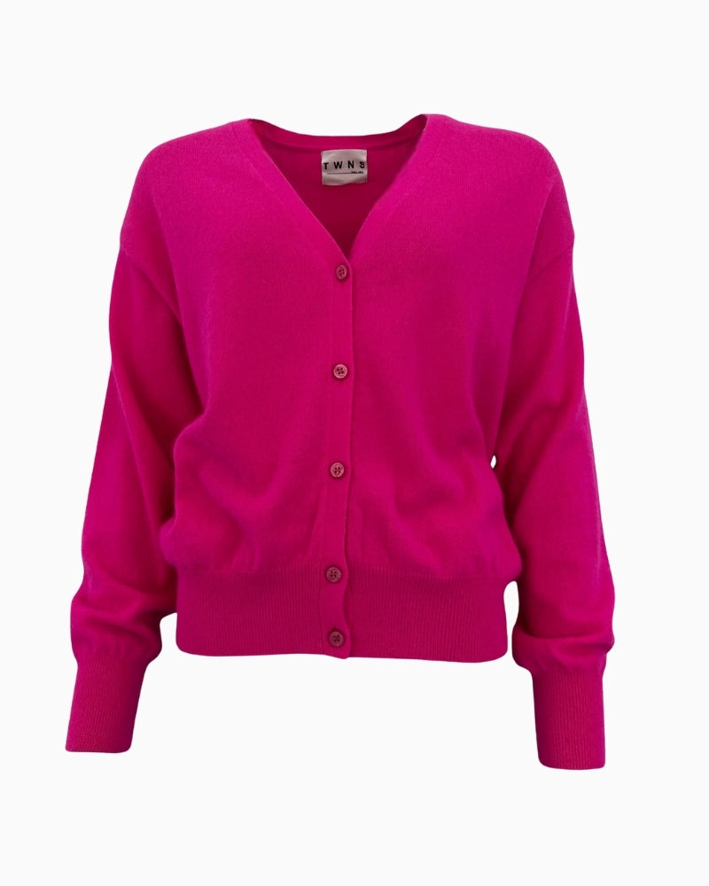 Front view of TWNS Aspen cardigan in neon pink with v-neck and colour buttons
