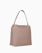 Valentino Brixton bag styled with neutral outfit for smart everyday use