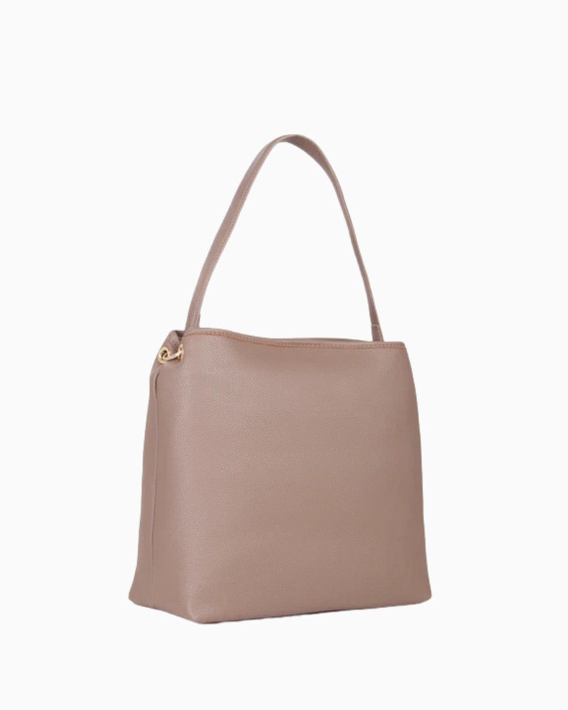 Valentino Brixton bag styled with neutral outfit for smart everyday use